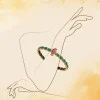 22KT Gold Emerald Bangles
22KT Gold Emerald Bangles