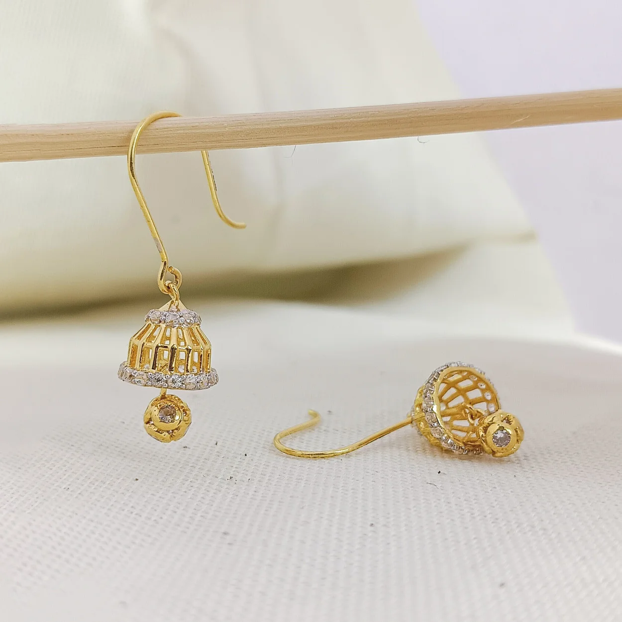 Eye-Catching Double Layer Long Jhumka Earrings Gold Covering Designs J25121  | Jhumka earrings, Gold earrings, Earrings artificial