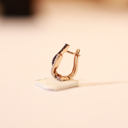 18 KT Gold Ocean Wave Hoop Earrings 18 KT Gold Ocean Wave Hoop Earrings