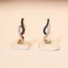 18 KT Gold Ocean Wave Hoop Earrings