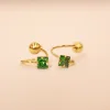 18 KT Gold Emerald Twist Stud Earrings