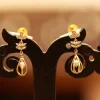 22KT Gold Elara Leaf Drop Earrings 22KT Gold Elara Leaf Drop Earrings