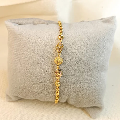 Gold balls bracelet deals designs